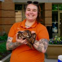 John Ball Zoo partner holds a snake